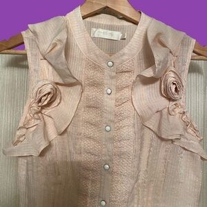 mM Couture  peach colour, ruffled, fitted , buttoned sleeveless blouse